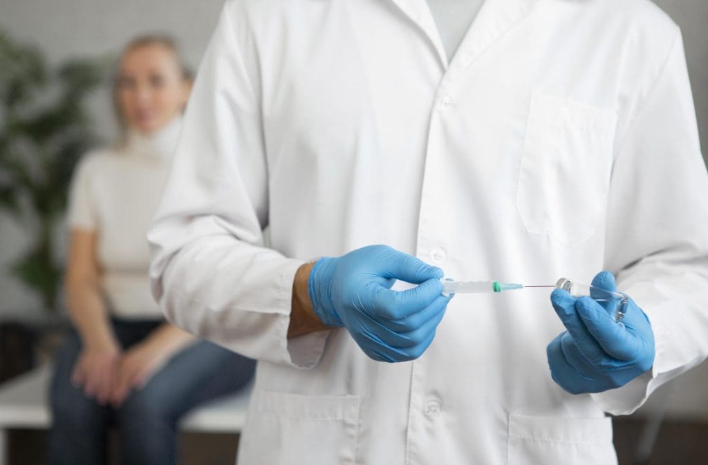 close up hands holding syringe LIV Hospital