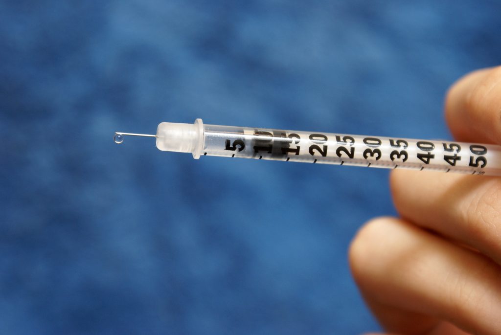 close up human hand against blue wall LIV Hospital