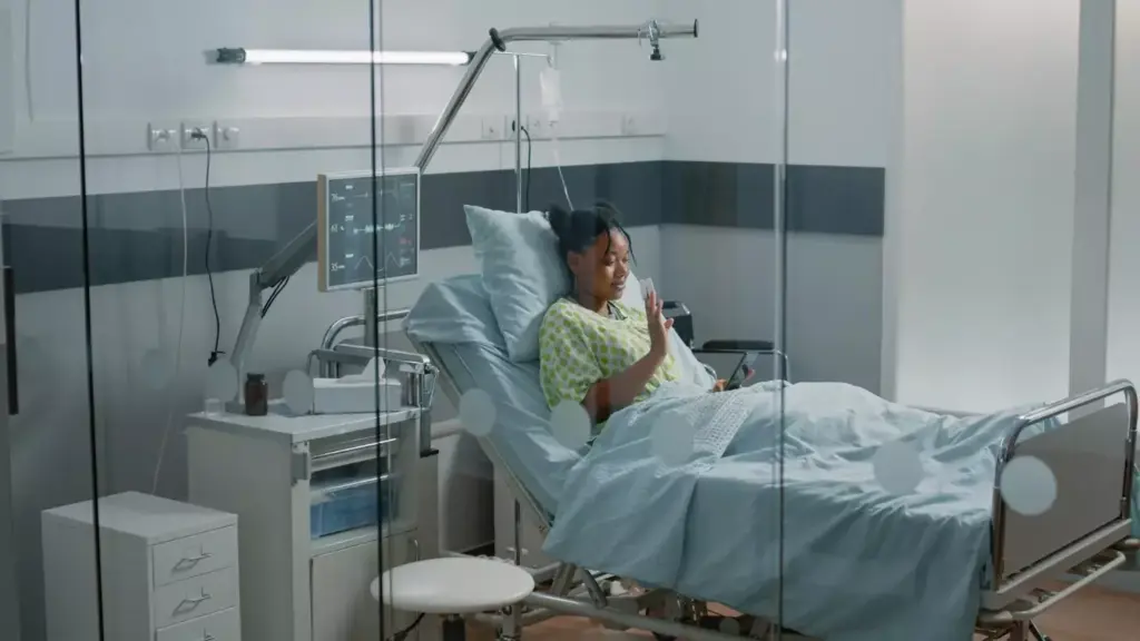 A brightly lit hospital room, the soft glow of medical equipment casting a soothing ambiance. In the foreground, a patient reclining comfortably, their arm extended with an intravenous tube delivering the life-saving chemotherapy infusion. The nurse, dressed in scrubs, carefully monitors the process, their expression one of compassion and professionalism. In the background, the room's clean, sterile environment evokes a sense of security and care, with medical charts and supplies neatly organized, conveying the expertise and dedication of the healthcare team. The overall scene captures the essence of "Understanding Cancer Infusion Therapy" - a delicate balance of medical technology, human touch, and the unwavering commitment to patient well-being.