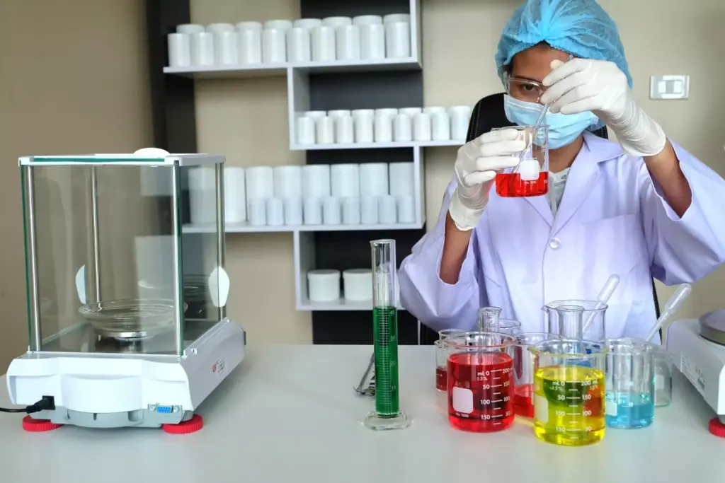 A clinical laboratory setting with various medical equipment and supplies arranged neatly on a sterile, well-lit counter. In the foreground, vials of chemotherapy drugs and syringes are carefully laid out, conveying the precision and care required for the TC regimen. In the middle ground, an infusion pump and IV tubing suggest the administration process. The background features diagnostic charts, shelves of reference materials, and a sense of the clinical environment where this treatment would be administered.