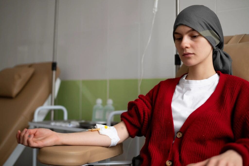 A close-up portrait of a woman undergoing breast cancer chemotherapy