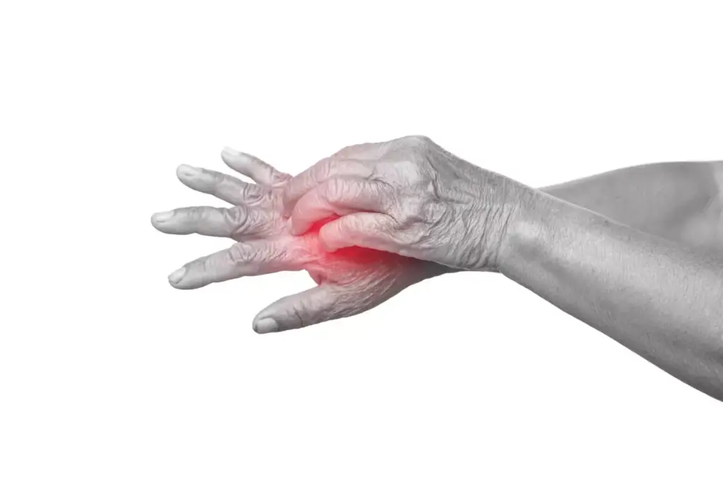 A detailed close-up of a human hand gripping tightly in pain, with visible signs of swelling and redness in the joints due to arthritis. The hand is set against a blurred background of medical instruments, suggesting the context of arthritis treatment and pain management. The lighting is soft and warm, creating an introspective and empathetic mood. The angle is slightly angled to capture the hand's expression of discomfort and the physical strain of the condition. The overall composition evokes a sense of the personal struggle and impact of arthritis pain on an individual's daily life.