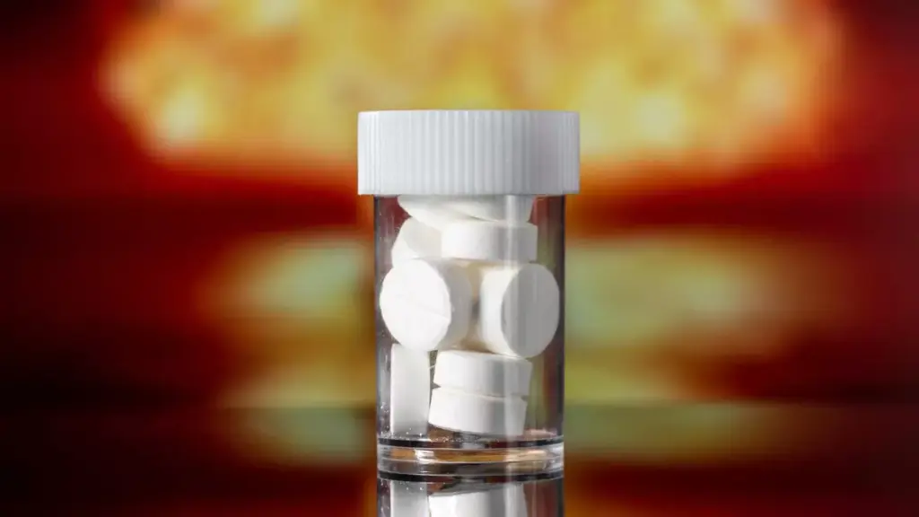 A detailed close-up view of the &quot;Tylenol Arthritis Extended Release&quot; product, showcasing its bottle and the distinctive red and white packaging design. The product is illuminated by warm, directional lighting, casting subtle shadows that accentuate its three-dimensional form. The focus is crisp and the depth of field is shallow, drawing the viewer's attention to the intricate label details. The overall mood is one of clarity and professionalism, reflecting the product's medical nature and positioning as a trusted arthritis relief solution.