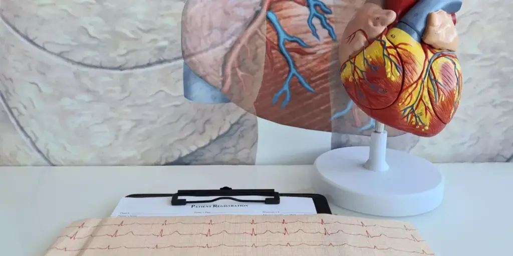 A detailed medical diagram showcasing key terms and concepts related to Acute Myocardial Infarction (AMI). The image should feature a crisp, clinical aesthetic with a white background and bold, high-contrast typography. In the foreground, prominent AMI-related terms such as "Myocardium," "Ischemia," "Necrosis," and "Arrhythmia" should be displayed using a clean, sans-serif font. The middle ground should contain simplified anatomical illustrations of the heart and surrounding structures, rendered in a minimalist, diagrammatic style. In the background, faint wireframe outlines of the circulatory system and other relevant medical imagery should provide context. The overall composition should convey a sense of medical authority and clarity, serving as a helpful visual guide for the "AMI in Medical Terms" section of the article.