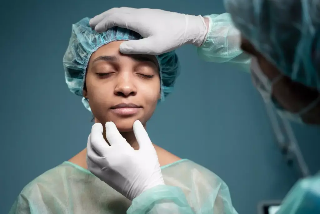 A detailed surgical scene depicting a brain biopsy procedure. The foreground shows a surgeon's gloved hand gently inserting a long, thin needle into the patient's exposed skull, guided by a high-resolution imaging screen. The middle ground reveals the sterile operating theater, with nurses and assistants standing by, surrounded by specialized medical equipment. In the background, moody lighting casts long shadows, creating a sense of focus and gravity to the delicate operation. The overall atmosphere is one of precise, controlled medical intervention, conveying the technical expertise required for this complex neurosurgical procedure. A detailed surgical scene depicting a brain biopsy procedure. The foreground shows a surgeon's gloved hand gently inserting a long, thin needle into the patient's exposed skull, guided by a high-resolution imaging screen. The middle ground reveals the sterile operating theater, with nurses and assistants standing by, surrounded by specialized medical equipment. In the background, moody lighting casts long shadows, creating a sense of focus and gravity to the delicate operation. The overall atmosphere is one of precise, controlled medical intervention, conveying the technical expertise required for this complex neurosurgical procedure.