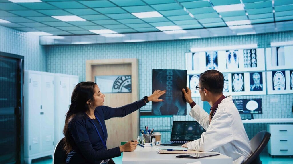 A dimly lit medical examination room, the patient's worried expression capturing the challenge of an accurate osteoarthritis diagnosis