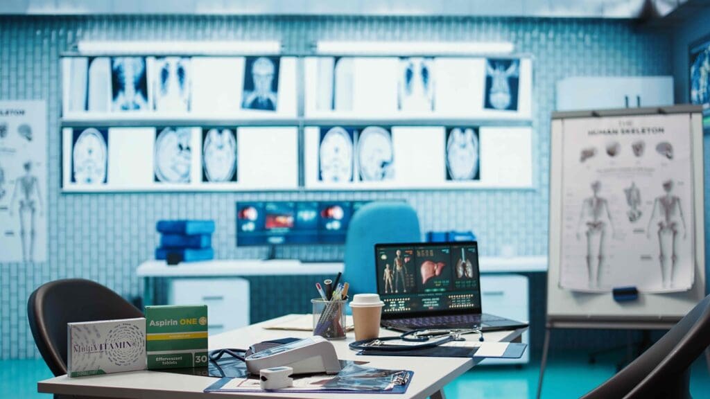 A dimly-lit, modern medical office with sleek furniture and equipment