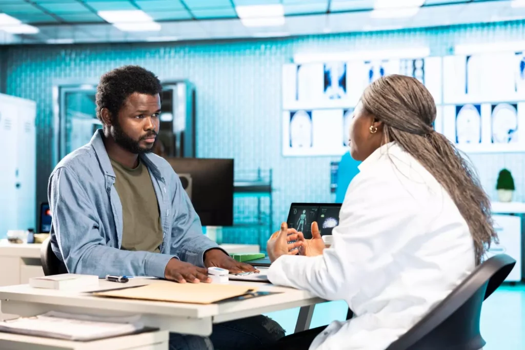 A doctor talking to a patient