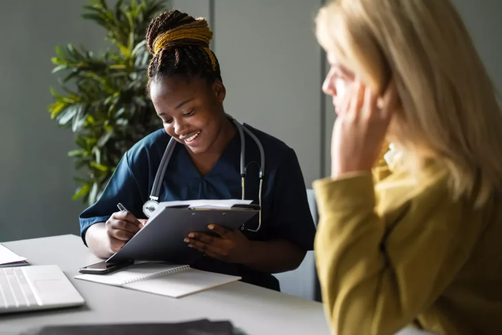 A doctor talking to a patient