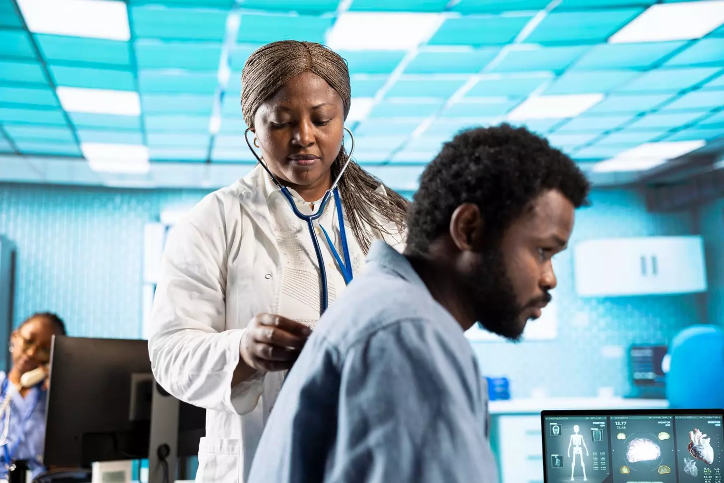 A doctor talking to a patient
