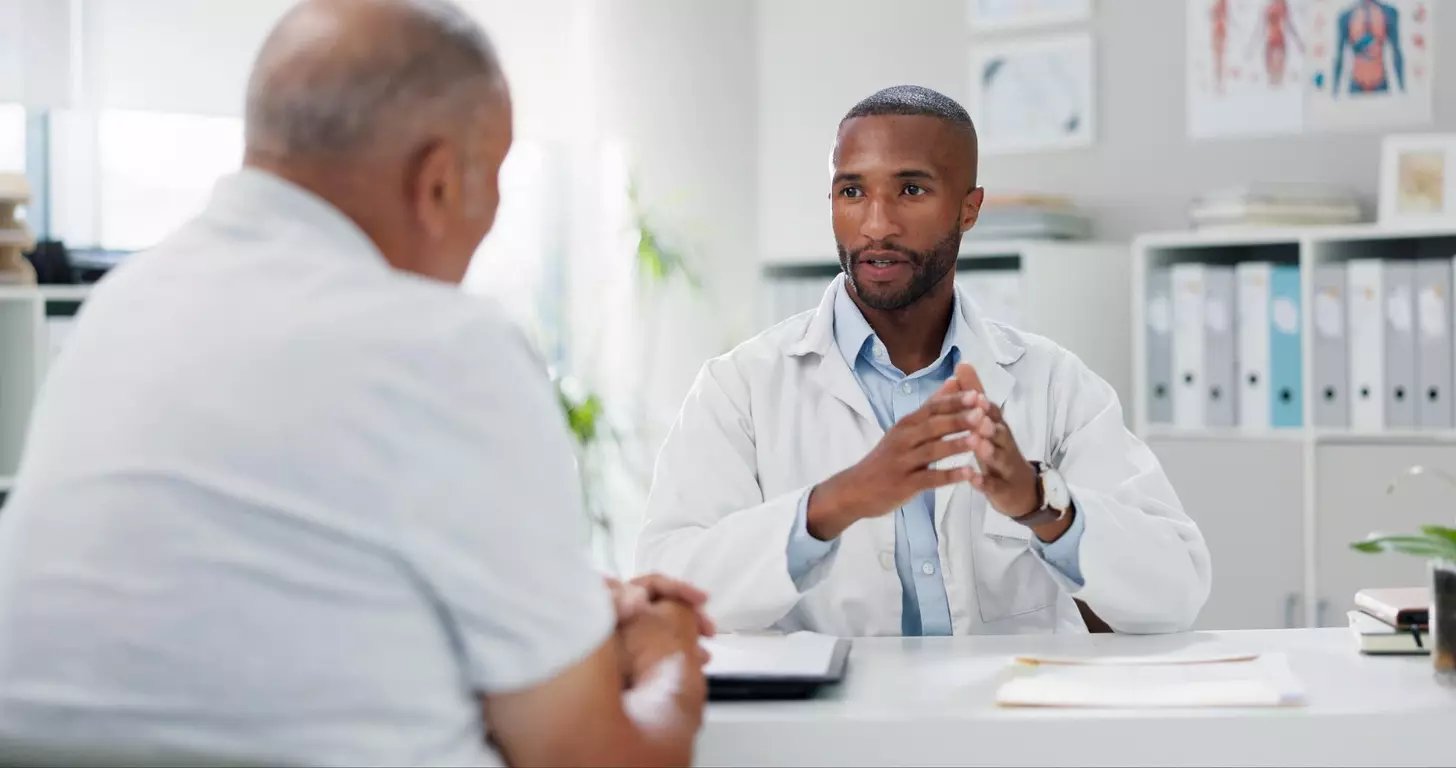 A doctor talking to a patient