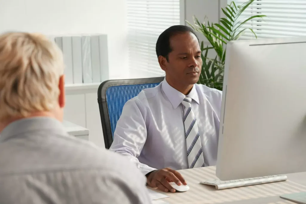 A doctor talking to a patient