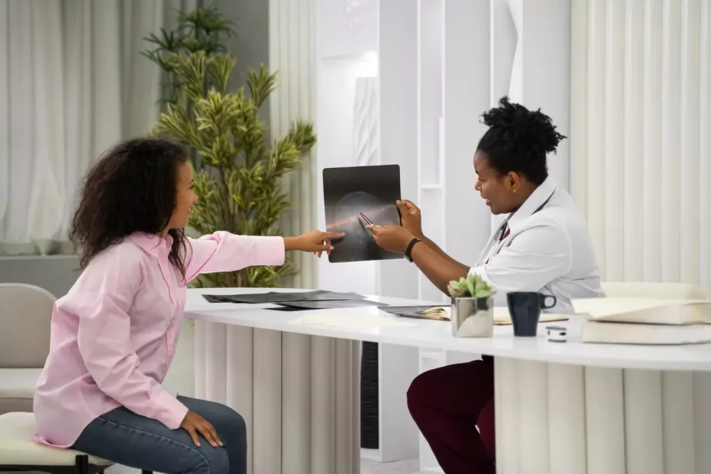 A doctor talking to a patient 38 LIV Hospital