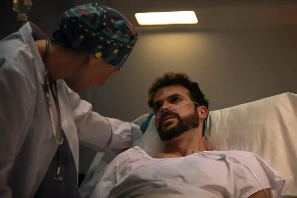 A glioblastoma progression scene with a somber, introspective atmosphere. In the foreground, a close-up of a patient's face, their features hollowed by the ravages of the disease, eyes sunken and weary. In the middle ground, a hospital bed shrouded in muted grays and blues, IV lines snaking across the sheets. The background fades into a hazy, muted landscape, conveying the sense of a world receding from the patient's view. Soft, diffused lighting casts gentle shadows, heightening the sense of fragility and quiet resignation. The overall composition evokes the patient's gradual, inevitable journey through the final stages of this relentless cancer.