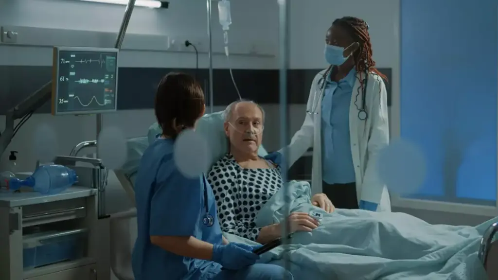 A hospital emergency room, dimly lit with an intense focus on a patient suffering a heart attack. In the foreground, medical staff urgently perform CPR, their faces tense with concentration. Behind them, a defibrillator stands ready, its charged pads poised to deliver a life-saving jolt. The background is a blur of activity, nurses and doctors rushing to gather supplies, the air thick with the urgency of the situation. The lighting is dramatic, casting deep shadows that convey the gravity of the moment. The overall scene is one of high-stakes medical intervention, a race against time to save a life during the critical golden hour.