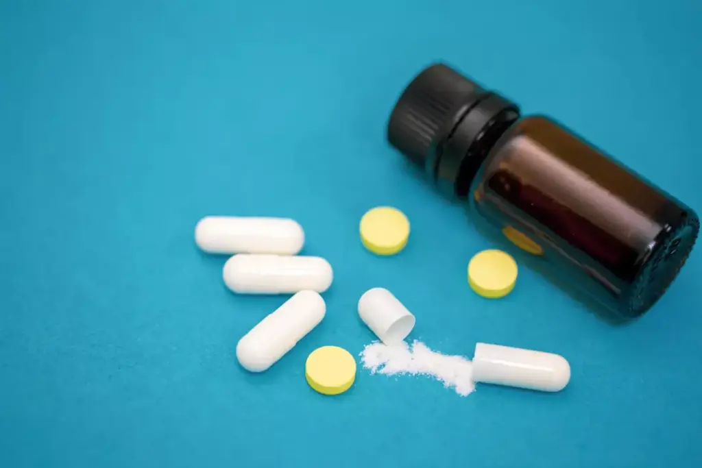 A neatly arranged assortment of various prescription arthritis pain relief medications, including capsules, tablets, and topical ointments. The scene is set against a clean, minimalist background, with subtle lighting accentuating the textures and colors of the medications. The arrangement conveys a sense of medical professionalism and the effectiveness of these treatments in addressing joint pain and inflammation associated with arthritis. The overall mood is one of clinical precision and the promise of relief for those suffering from this chronic condition.