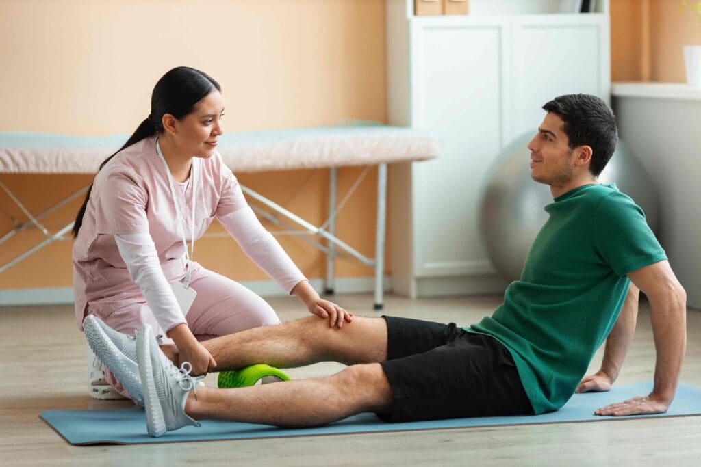A person in a physical therapy session, diligently going through exercises to regain mobility and strength in their partially replaced knee