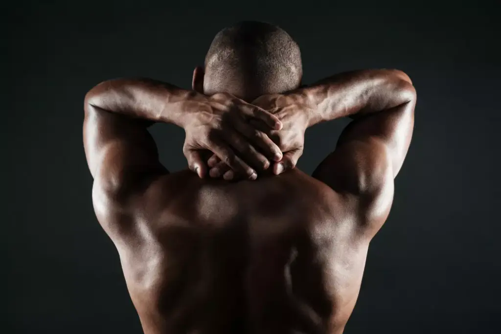 A person performing shoulder joint exercises in a bright, airy studio. The subject is shown in profile, with a focus on the upper body and shoulder area. The lighting is soft and diffused, creating a warm, calming atmosphere. The background is minimalist, with clean lines and neutral tones to draw attention to the exercise movement. The model demonstrates a series of gentle, controlled shoulder rotations and raises, showcasing proper form and technique for relieving cervical shoulder pain. The overall scene conveys the benefits of regular, targeted shoulder exercises for improving mobility and reducing discomfort.