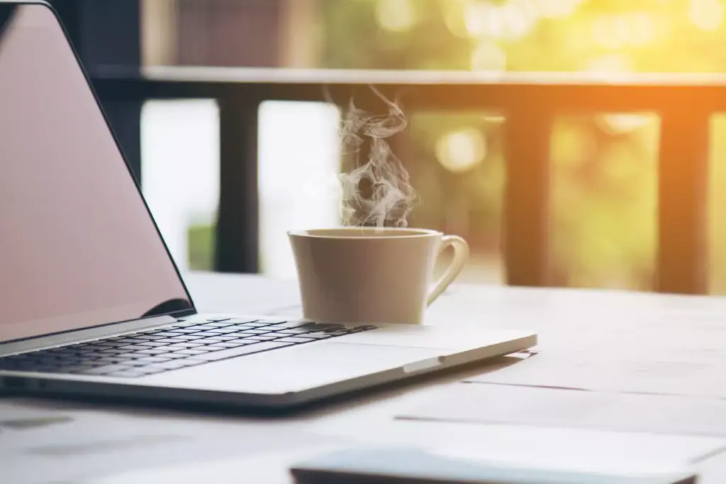 A serene, sun-dappled office space, with a large wooden desk at the center. On the desk, a laptop, a few carefully arranged documents, and a pen resting beside a cup of steaming coffee. In the foreground, a person's hands thoughtfully sketching a recovery plan on a piece of paper, the pencil strokes deliberate and focused. Behind them, a large window overlooking a lush, verdant garden, the soft natural light filtering in and casting a warm, contemplative glow. The atmosphere is one of concentration, determination, and a sense of renewal, as the person embarks on their journey of recovery.