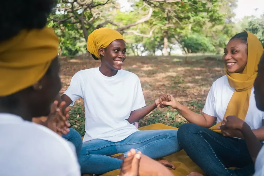 A serene, well-equipped rehabilitation center nestled in a lush, verdant landscape. In the foreground, a group of patients engaged in a supportive group therapy session, their expressions reflecting a sense of hope and determination. The middle ground showcases a variety of therapeutic activities, from art classes to mindfulness exercises, all designed to aid in the recovery process. The background depicts a tranquil, sun-dappled garden, where patients can find solace and peace during their journey towards healing. The lighting is soft and natural, lending a sense of calm and rejuvenation to the scene. The overall atmosphere conveys the understanding that drug addiction is a treatable condition, where compassionate care and evidence-based therapies can empower individuals to reclaim their lives.