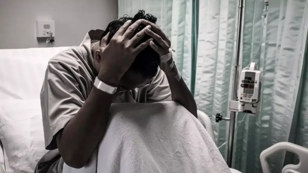 A somber, emotive portrait of the physical and emotional toll of chemotherapy. In the foreground, a gaunt, weary figure sits amid a tangled web of medical tubes and equipment, their eyes downcast, skin pallid and sunken. Wispy, unkempt hair hints at the ravages of treatment. The middle ground is shrouded in a muted, hazy atmosphere, evoking a sense of detachment and isolation. In the background, a blurred, indistinct landscape suggests the broader disruption and upheaval caused by the cancer journey. Soft, diffused lighting casts a melancholic glow, capturing the gravity and personal struggle of life after chemotherapy.