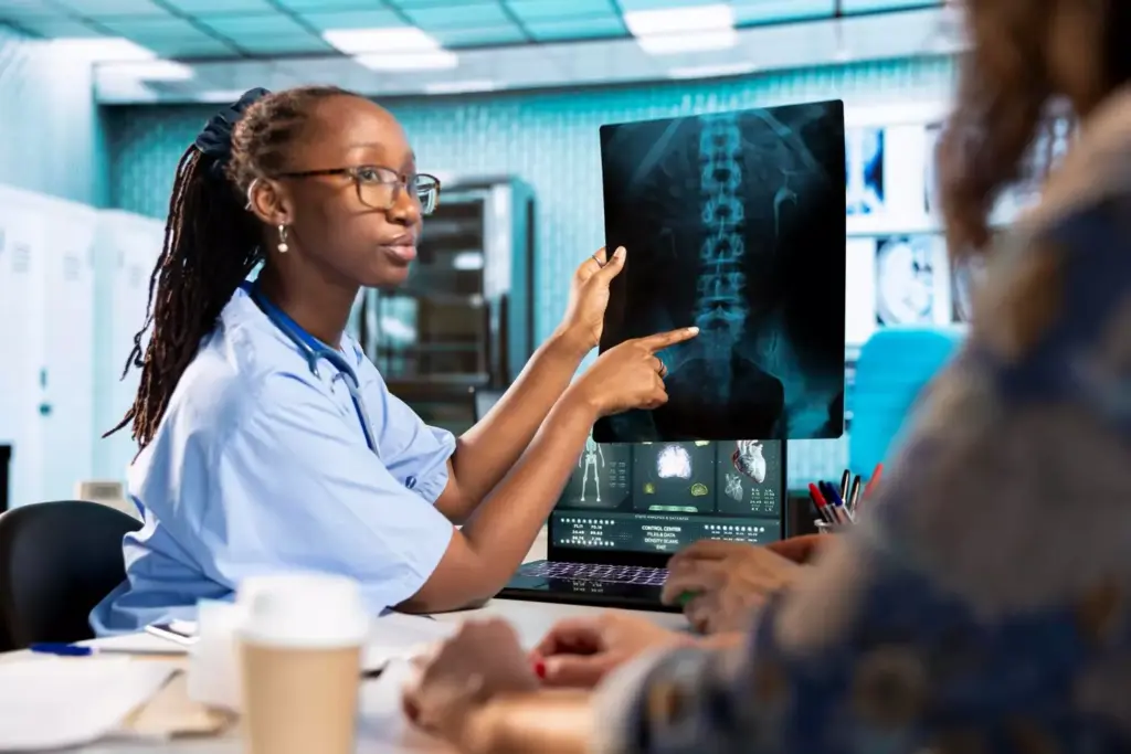 A surgical diagram showcasing a successful 360 spinal fusion procedure. In the foreground, a detailed cross-section of the spine, with vertebrae, discs, and surrounding tissues rendered in high contrast. Metallic implants and hardware are visible, illustrating the fusion process. The middle ground features a sleek, minimal 3D model of the human spine, rotated to display the 360-degree fusion. The background is a softly blurred medical environment, conveying a sense of clinical precision. Crisp lighting illuminates the scene, casting subtle shadows that emphasize the depth and structure of the anatomy. The overall mood is one of technical proficiency, highlighting the success and effectiveness of this specialized surgical technique.