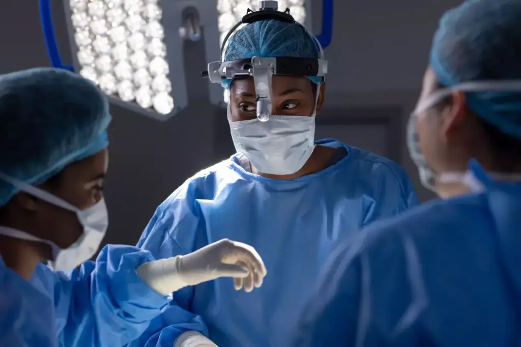 A surgical theater bathed in soft, diffuse lighting, where a team of skilled physicians carefully examines a patient's neck, preparing for a complex procedure. The foreground features the patient's exposed neck, the skin marked with precise incision lines as the surgeons analyze the delicate anatomy. In the middle ground, specialized medical instruments gleam, ready to assist in the intricate operation. The background is obscured in a hazy blur, emphasizing the focused attention on the patient's well-being. Conveying a sense of gravity and expertise, this image captures the essence of neck surgery and the dedication required to perform these critical procedures.