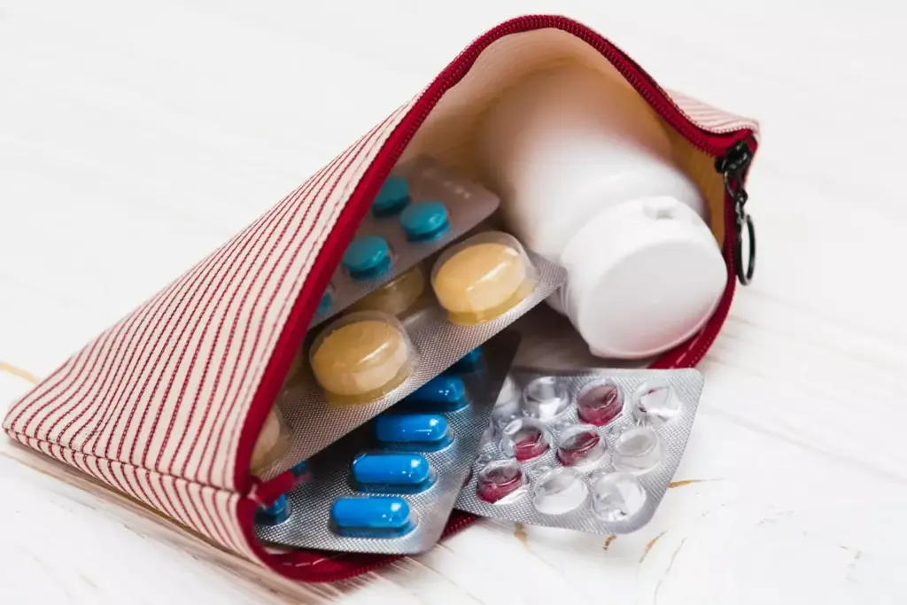 A well-organized and visually appealing chemotherapy survival pack, resting on a soft, neutral-toned surface. The pack features an assortment of essential items, including a cozy blanket, a water bottle, healthy snacks, a notebook and pen, and various comfort items like lip balm and hand sanitizer. The lighting is soft and diffused, creating a calming, supportive atmosphere. The composition is balanced, with the pack positioned centrally, allowing the viewer to focus on the thoughtfully curated contents. The image conveys a sense of preparedness, care, and the determination to face the challenges of chemotherapy treatment.