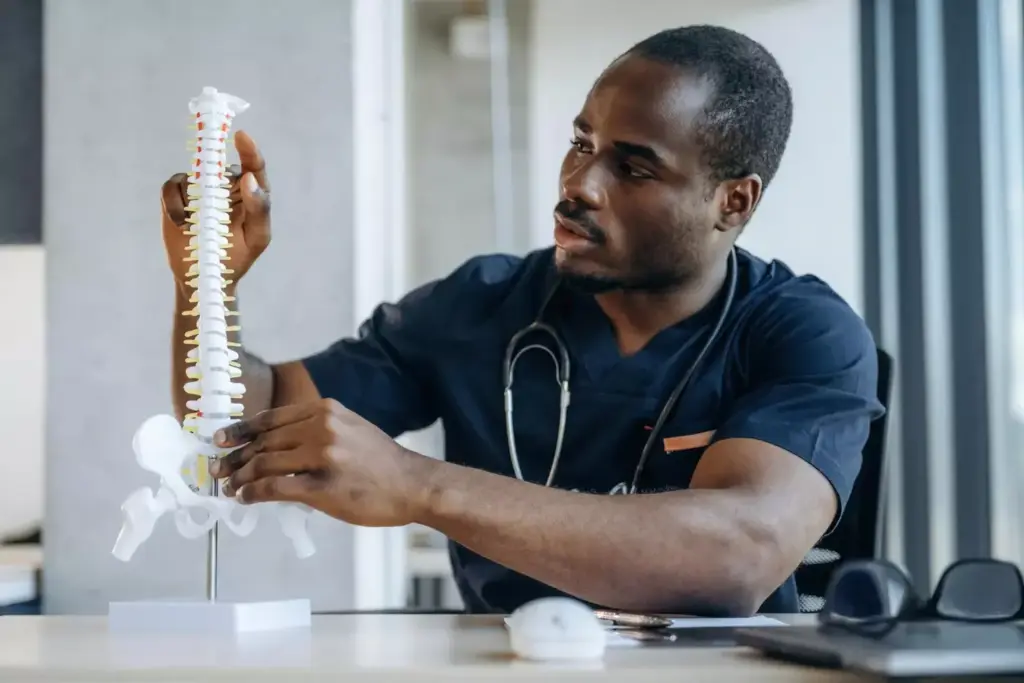 Detailed cross-section of exposed spinal cord and nerves during complex cervical spine surgery. Intricate neural anatomy with delicate nerve fibers visible under bright, focused surgical lighting. Tense, clinical atmosphere with a sense of meticulous precision as the surgeon navigates this sensitive area. Muted color palette of grays, whites, and pale blues emphasizes the technical nature of the procedure. High-resolution, photorealistic rendering captures the gravity and technical complexity of this critical stage of the operation. Detailed cross-section of exposed spinal cord and nerves during complex cervical spine surgery. Intricate neural anatomy with delicate nerve fibers visible under bright, focused surgical lighting. Tense, clinical atmosphere with a sense of meticulous precision as the surgeon navigates this sensitive area. Muted color palette of grays, whites, and pale blues emphasizes the technical nature of the procedure. High-resolution, photorealistic rendering captures the gravity and technical complexity of this critical stage of the operation.