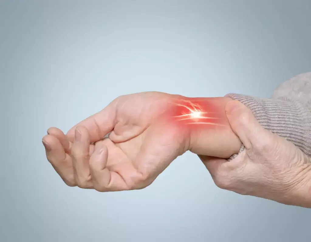 Detailed medical illustration of a carpal tunnel release surgery. In the foreground, a realistic close-up view of the surgical incision in the palm, exposing the transverse carpal ligament. Precise anatomical detail of the exposed tendons and nerves. Bright surgical lighting illuminates the scene, creating clear shadows and highlights. In the middle ground, the surgeon's gloved hands meticulously operating with surgical tools. The background shows a sterile operating room environment with medical equipment. The overall mood is clinical, informative, and focused on the technical aspects of the procedure. Detailed medical illustration of a carpal tunnel release surgery. In the foreground, a realistic close-up view of the surgical incision in the palm, exposing the transverse carpal ligament. Precise anatomical detail of the exposed tendons and nerves. Bright surgical lighting illuminates the scene, creating clear shadows and highlights. In the middle ground, the surgeon's gloved hands meticulously operating with surgical tools. The background shows a sterile operating room environment with medical equipment. The overall mood is clinical, informative, and focused on the technical aspects of the procedure.