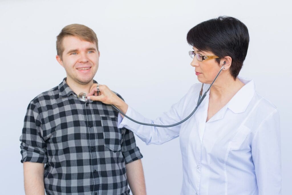 doctor examining patient