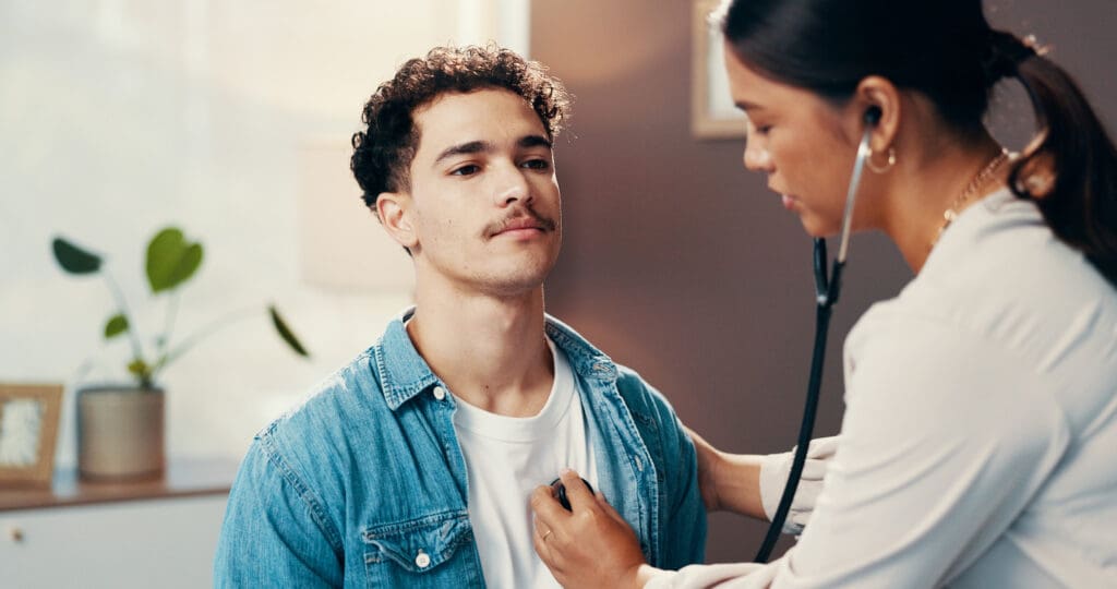 doctor examining patient