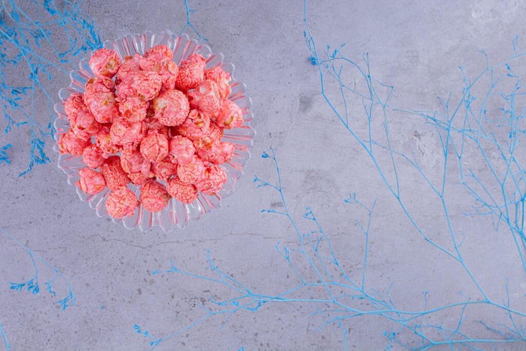 What is the new treatment for myelodysplasia? 1 glass holder with portion popcorn candy decorative blue branches marble background high quality photo LIV Hospital