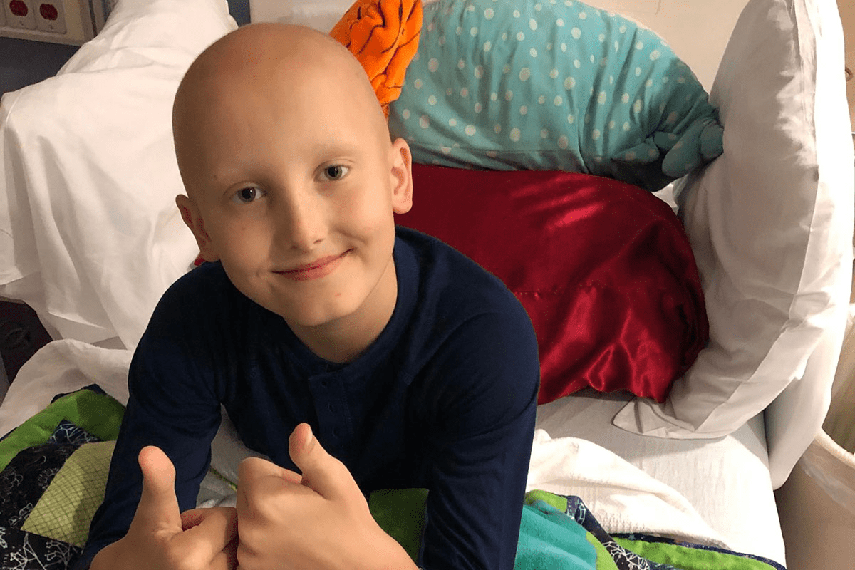What is the Age of Onset for most common childhood cancer?