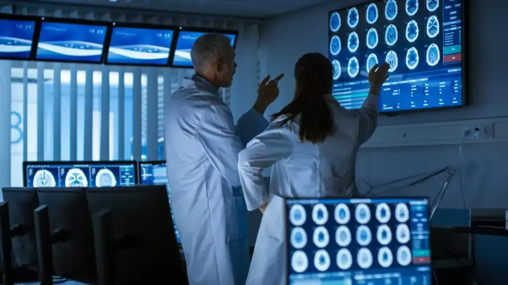 medical doctors discussing mri brain scans 
